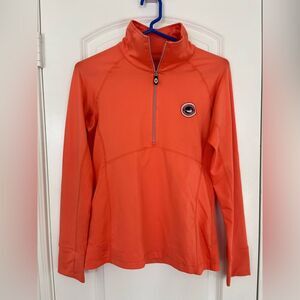 Kate Lord Women’s Orange Golf Quarter Zip